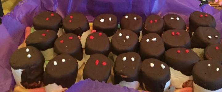 Marshmallows dipped in chocolate