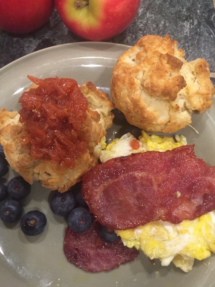 Biscuit scrambled eggs quince jam turkey bacon
